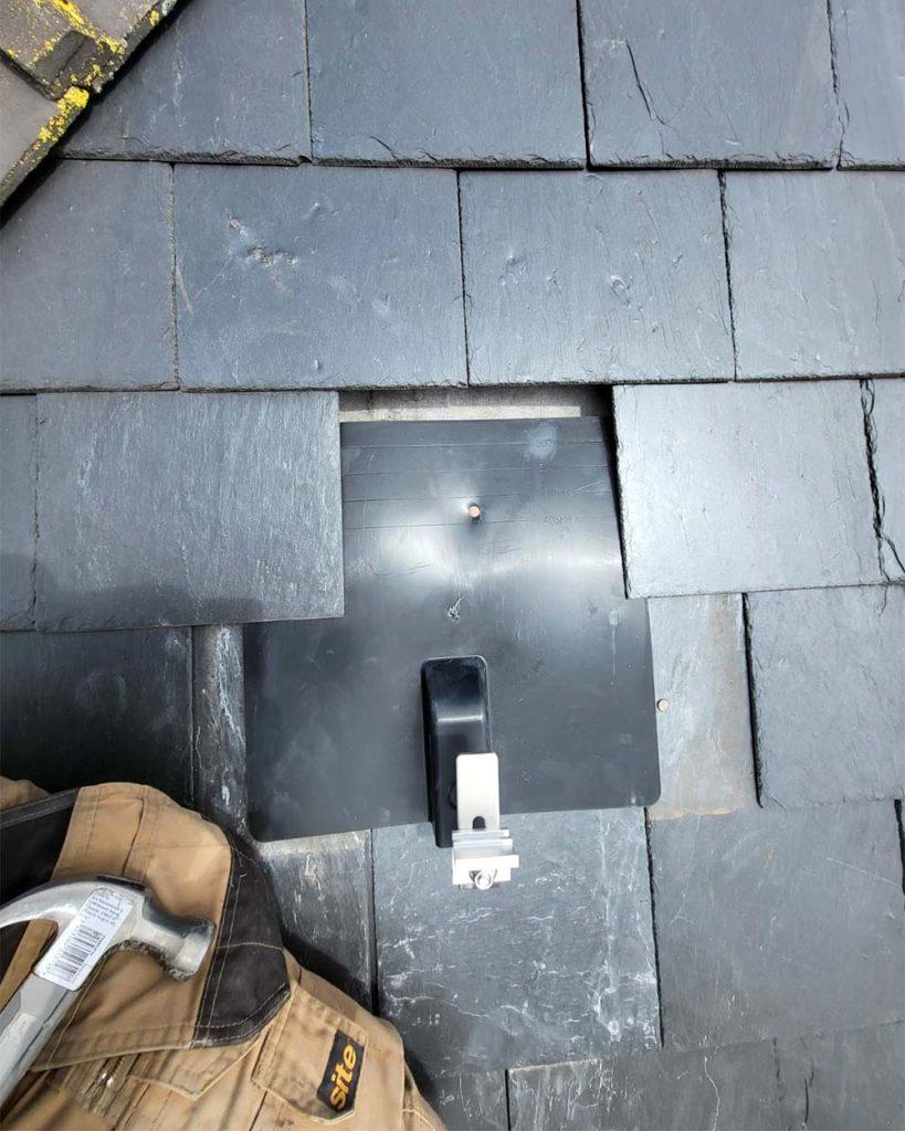 Slate roof flashing for solar panels